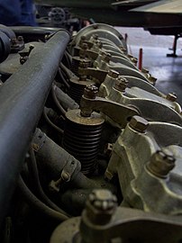 Detail closeup of a Liberty L-12's upper valvetrain, showing the similarity to the later-production Mercedes design