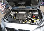 Open engine compartment of a Subaru WRX, showing the horizontally-opposed "boxer" engine coded "FA20F"