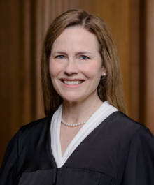 Barrett wearing a judicial robe