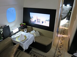 First class travel: Etihad Airways' "The Residence" suite on their Airbus A380-800s are equipped with a bedroom, living room and an en-suite shower room