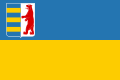 The flag of the Zakarpattia Oblast is a Ukrainian flag defaced with the coat of arms