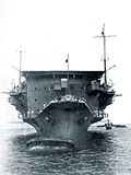 The ship, facing the bow