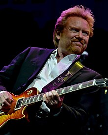 Musician Lee Roy Parnell playing an electric guitar