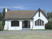 The George H. Vradenburg House/Tudor Revival Residence was built in 1925 and is located at 1600 W. Colter St. It was listed in the National Register of Historic Places in March 2003, reference #10000156.