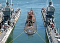 Los Angeles class fast attack submarine USS Asheville (SSN-758) enters the floating dry dock of Arco (ARDM-5) for scheduled maintenance
