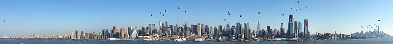 A panorama of Manhattan, the world's largest central business district, February 2018. 1. Riverside Church • 2. Time Warner Center • 3. 220 Central Park South • 4. Central Park Tower • 5. One57 • 6. 432 Park Avenue • 7. 53W53 • 8. Chrysler Building • 9. Bank of America Tower • 10. Conde Nast Building • 11 The New York Times Building • 12 Empire State Building • 13. Manhattan West • 14a: 55 Hudson Yards, b: 35 Hudson Yards, c: 10 Hudson Yards, d: 15 Hudson Yards) • 15. 56 Leonard Street • 16. 8 Spruce Street • 17. Woolworth Building • 18. 70 Pine Street • 19. 30 Park Place • 20. 40 Wall Street • 21. Three World Trade Center • 22. Four World Trade Center • 23. One World Trade Center