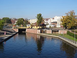 View of the city lock (in water on the left) and the trapezoidal lock (on the right side)