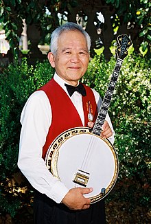 Charlie Tagawa, music director of the Peninsula Banjo Band