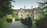 Manor House and attached walls and outbuildings