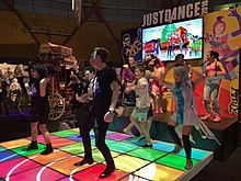 People playing just dance at a gaming convention in 2015.