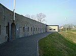 Wall with several metal gates