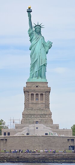 The Statue of Liberty as seen on a partly sunny day in June 2024.