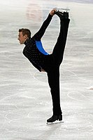 A standing split during a figure skating spin