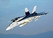 A Boeing F/A-18E Super Hornet produced by Boeing Defense, Space & Security, which is headquartered in St. Louis. The F/A-18E Super Hornet is assembled in the St. Louis area. (Photographed over the Persian Gulf; added to St. Louis)