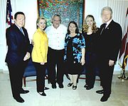 (L-R) Puerto Rico Secretary of State Kenneth McClintock, New York Senator Hillary Clinton , Tony Santiago, Milagros Santiago, Chelsea Clinton and former President of the United States Bill Clinton.