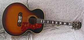 A picture of a Gibson J-200 guitar