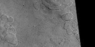 Wide view of scalloped terrain showing depressions merging, as seen by HiRISE under HiWish program