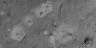 Close view of mud volcanoes and boulders, as seen by HiRISE under HiWish program