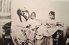Photograph showing Qadr with is father Wajid Ali Shah and his mother Begum Hazrat Mahal