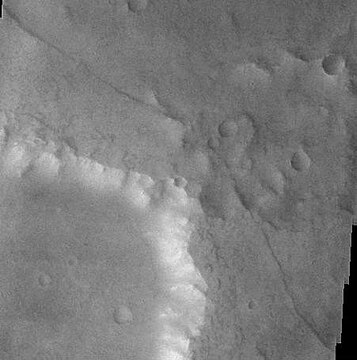 Dike near the crater Huygens shows up as narrow dark line running from upper left to lower right, as seen by THEMIS.