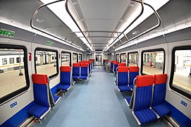 Passenger rows and seats inside intermediate car of Ivolga-0.0.
