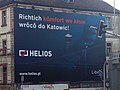 An advertising billboard in Silesian which means "True comfort in the cinema returns to Katowice! Helios"