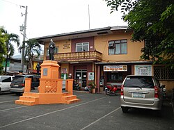 Old Municipal Hall building, with Dr. José P. Rizal statue