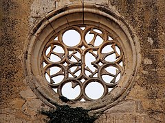 The Cross of Tau used to build patterns in a window at the Convent of Saint Anthony near Castrojeriz, Spain