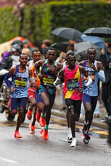 Group of multiple men running together