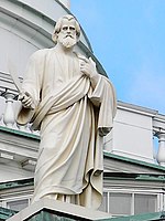 Statue of Saint Bartholomew by August Wredow at the roof of the Helsinki Cathedral