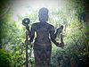 A statue in one of the caves at Phnom Sampeau