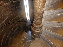 a photo of a spiral staircase looking down
