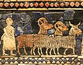 Detail of a man and three goats on the peace panels of the Standard of Ur.