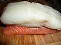 Halibut fillet (a whitefish) on top of a salmon fillet (a pelagic fish)