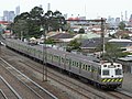 Hitachi in green and gold The Met livery near Middle Footscray, September 2006
