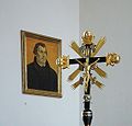 Processional crucifix with the portrait of Luther at Saint George's Lutheran church in Immeldorf, Lichtenau