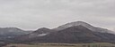 Vue de la ville, des montagnes Doupov et des ruines du château Lestkov.