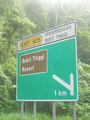 Malaysian expressway exit signs.