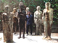 Chamila Gamage with sculptures