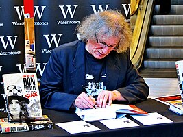 Powell signing copies of his biography Look Wot I Dun - My Life in Slade at Liverpool One's Waterstones in 2014