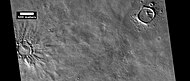 Layered features in craters, as seen by HiRISE under HiWish program