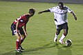 Troy Lessane (links) von Charleston Battery und Freddy Adu (rechts) von D.C. United am 14. Juni 2006