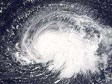 Satellite image of a tropical storm. An eye feature is invisible at this point.