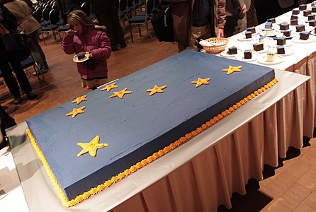 A large sheet cake, served at a political event
