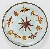 8th-9th-century dish with lustre paint, 25.1 cm (9.8 in) wide