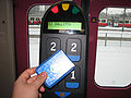 Smart card being used to pay for public transportation in the Helsinki area