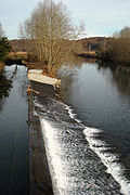 Photographie d'un barrage sur un cours d’eau.