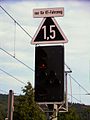 The situation beyond the last picture, speed limit still 20 km/h, except for "RT-Fahrzeuge" which are reduced to 15 km/h by the Zs3 plate mounted on top of an H/V main signal showing "Stop".