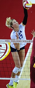 Karsta Lowe hitting volleyball.