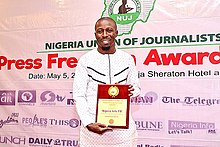 Manager, Nigeria Info FM Abuja Femi D Amele shortly after receiving the NUJ 2021 Press Freedom Awards